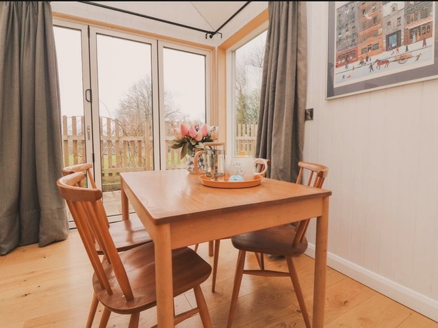 The Beehive lounge with log burner
